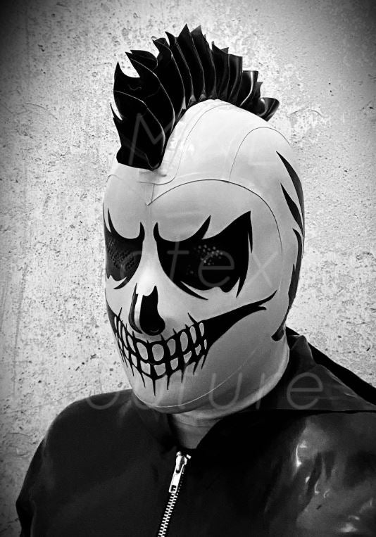 Latex hood grim reaper with perforated eyes, nose and mouth. Optional side wings details and latex mohawk.