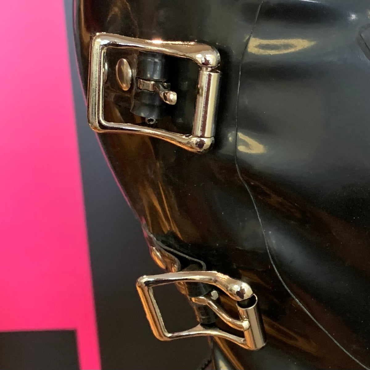 4 buckles on latex hood