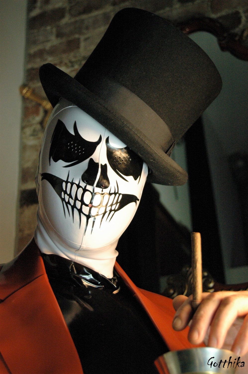 Latex hood grim reaper with perforated eyes, nose and mouth