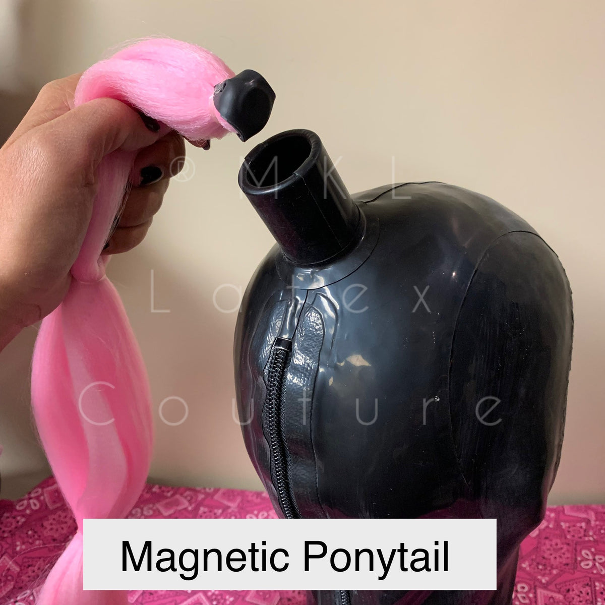 Latex hood with magnetic ponytail